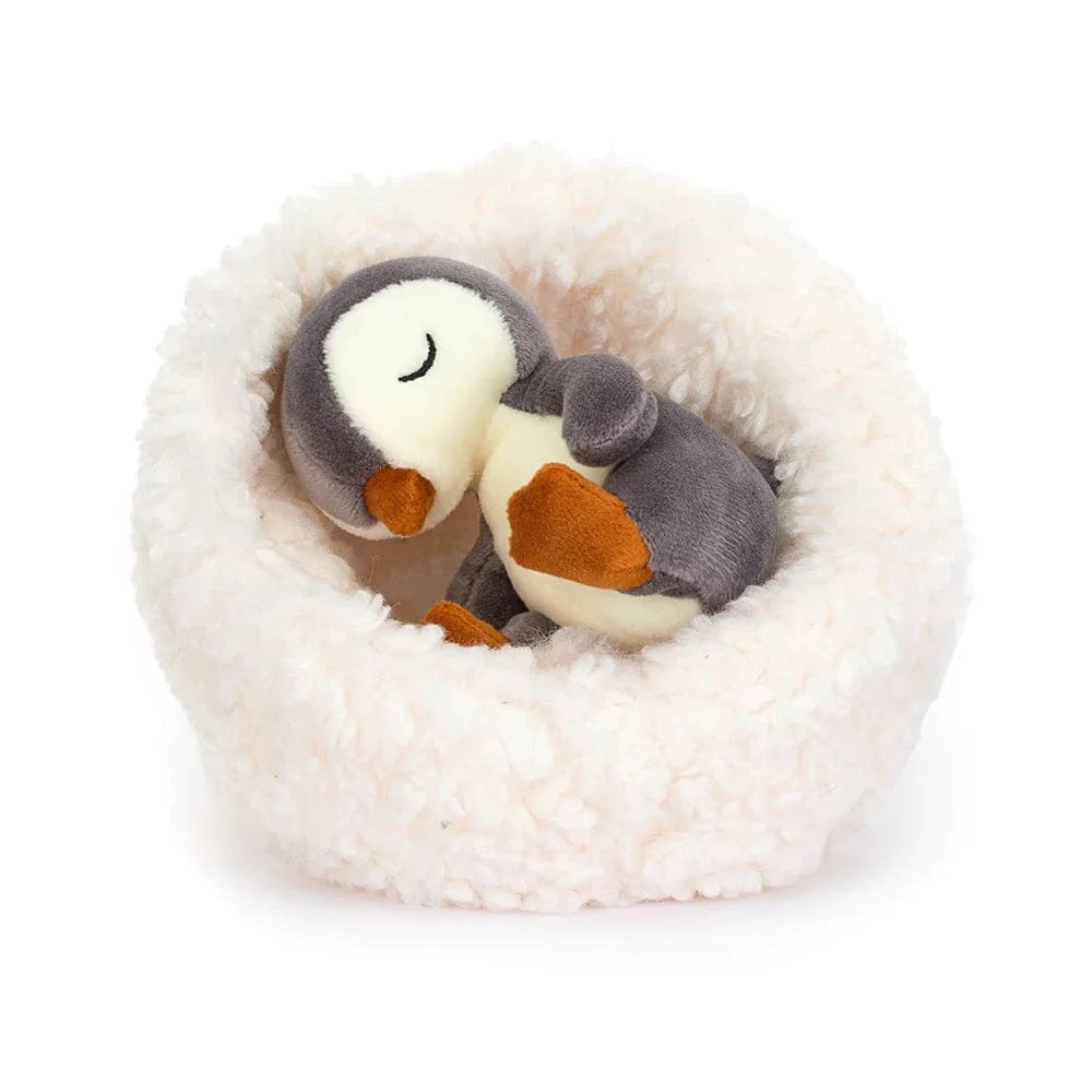 Fluffy and charming Jellycat itemsHibernating Penguin