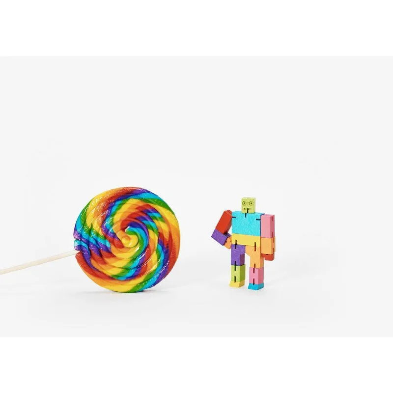 intricately carved wooden toys                   Areaware micro cubebot - rainbow