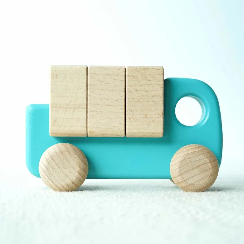 sustainable wooden toys                   Bajo light blue lorry with blocks