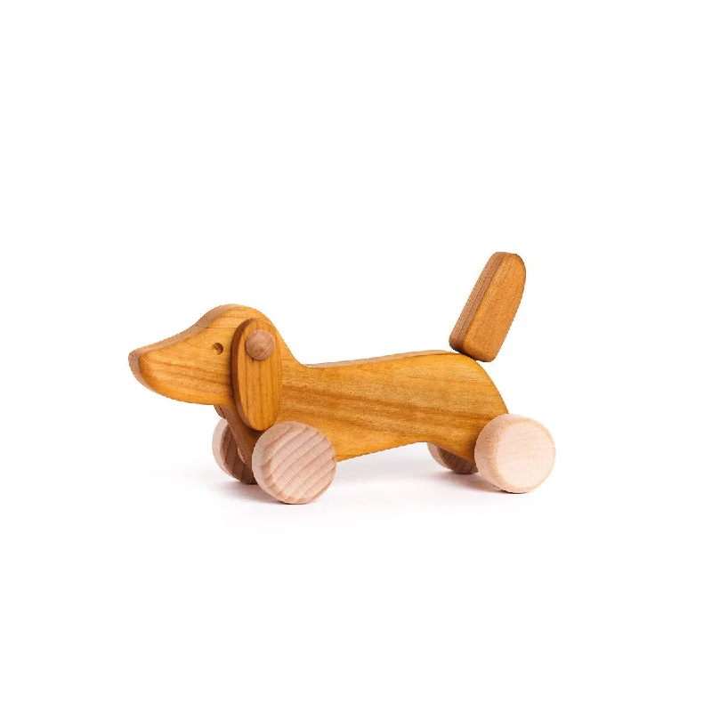 play-value packed wooden toys                   Bajo push along dachshund puppy natural