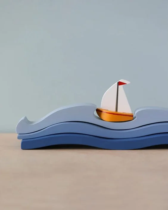 sturdy and reliable wooden toys that provide hours of fun                   Blue Water and Sail Boat Set