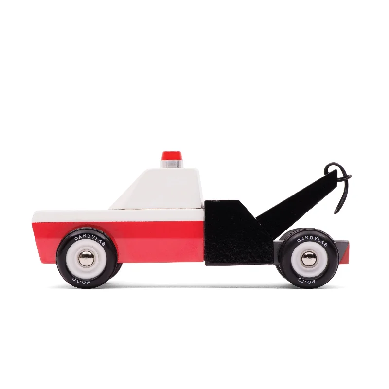 intricately carved wooden toys                   Candylab Towie