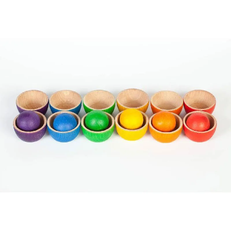 colorful and cheerful wooden toys                   Grapat coloured bowls and balls