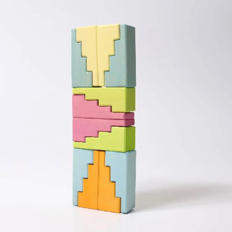 thoughtfully designed wooden toys              Grimm's pastel stepped roof