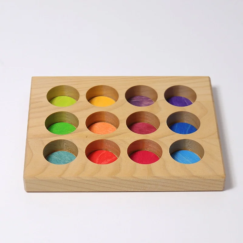safe wooden toys for babies              Grimm's sorting board rainbow