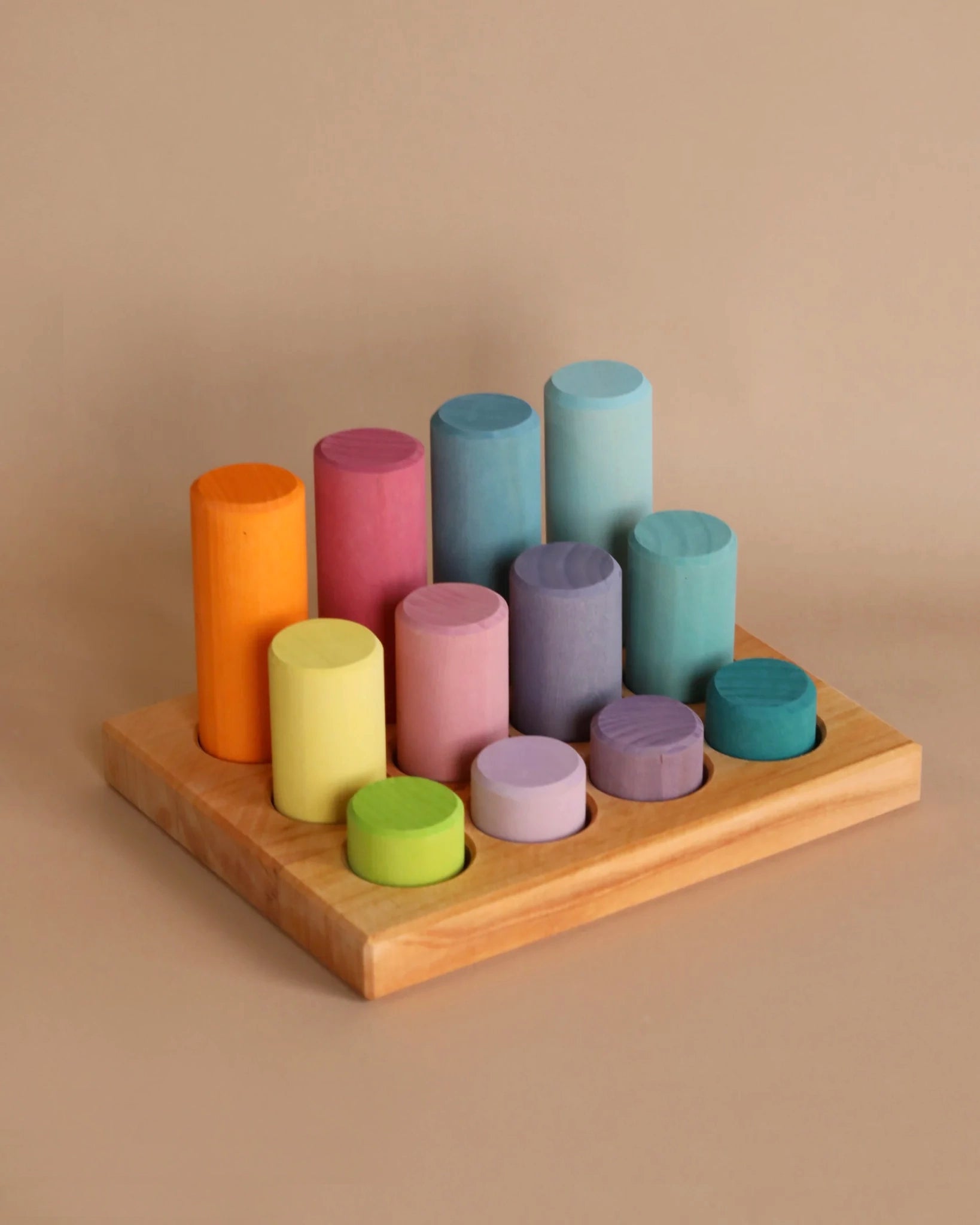 enchanting and whimsical wooden toys that captivate attention Grimm's Stacking Game Small Pastel Rollers enchanting and whimsical wooden toys that captivate attention Grimm's Stacking Game Small Pastel Rollers