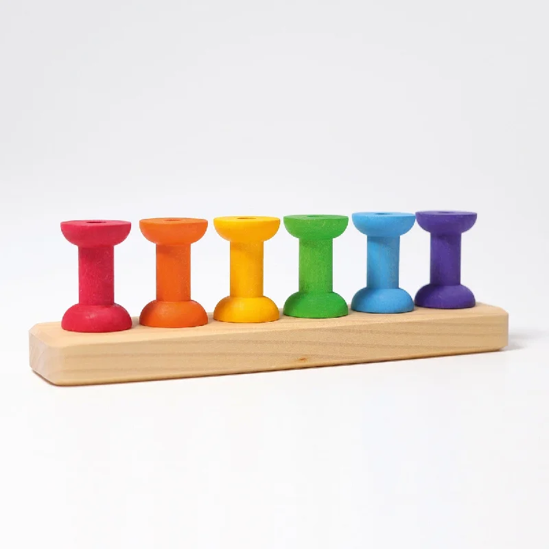 imaginative wooden toys                  Grimm's thread game small bobbins 8 pcs.