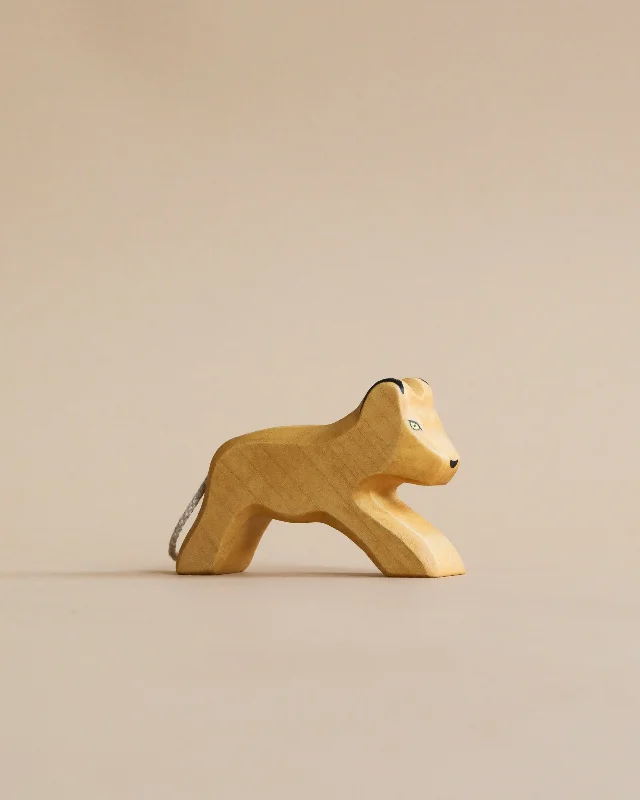 enchanting and whimsical wooden toys for children                   Handmade Holzwald Lion Cub
