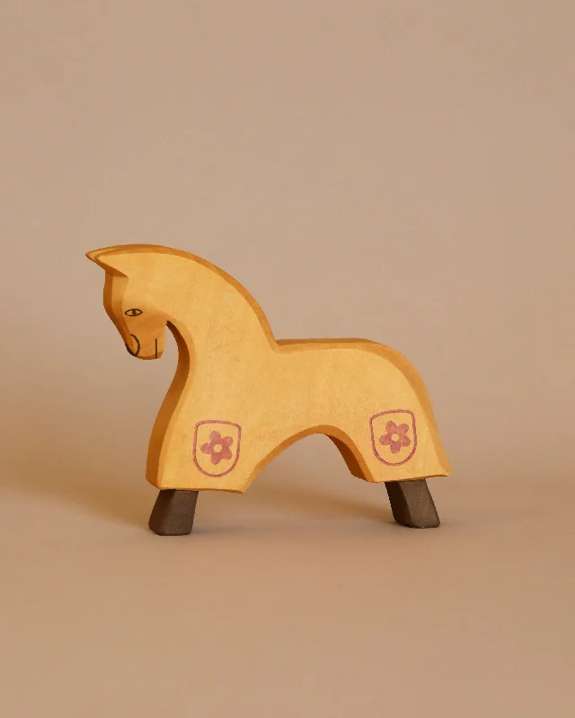eco-friendly wooden toys                   Ostheimer Yellow Horse for Knight