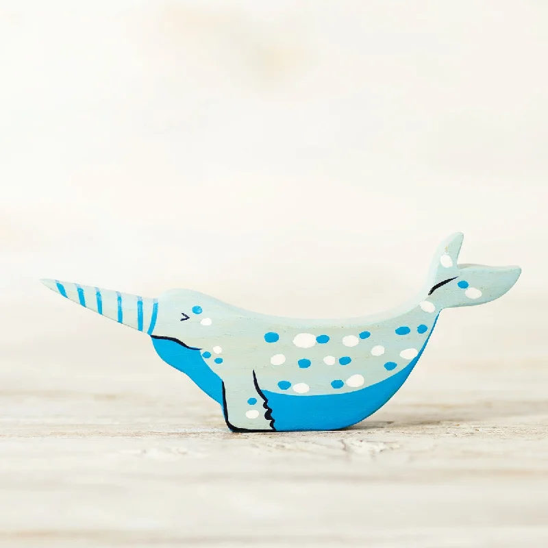 thoughtfully crafted and safe wooden toys                   Wooden Caterpillar narwhal
