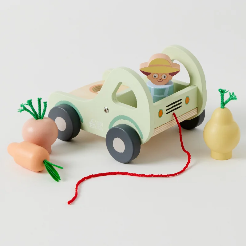 intricately designed wooden toys                 On the Farm Wooden Tractor & Farmer Set